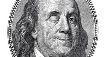 Benjamin Franklin blinking and smiling at you isolated on white